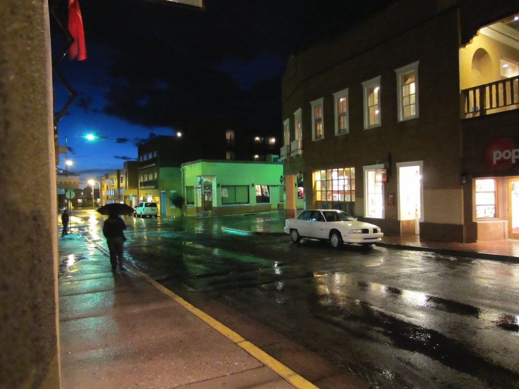 Wet streets of Santa Fe at night.