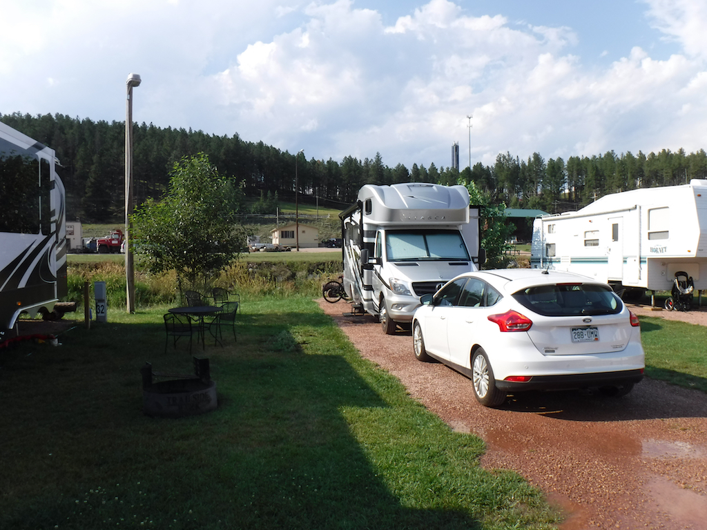 RVs parked at campground.