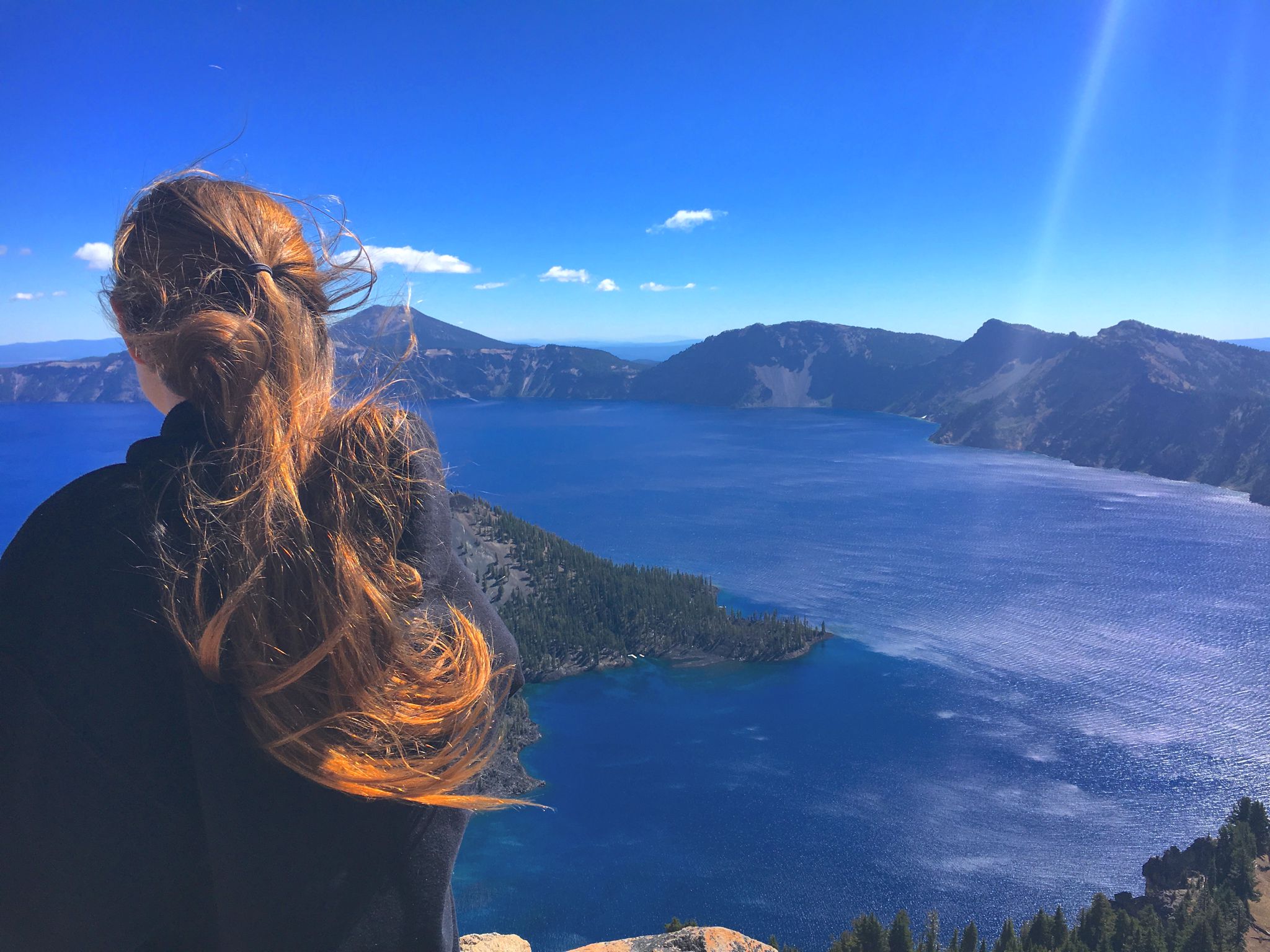 Woman looking out over Crater Lake.