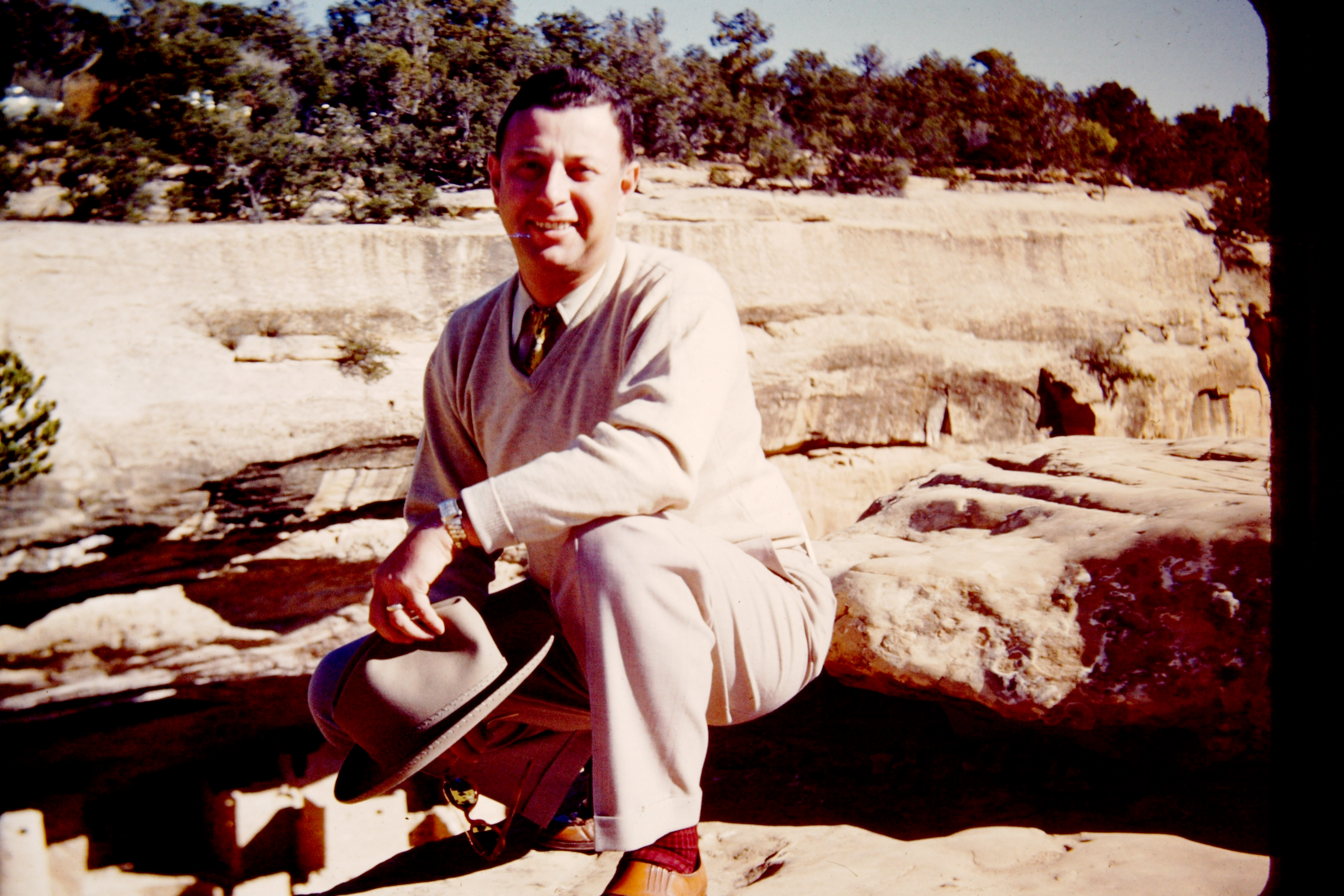Old photo of a man at a national park.