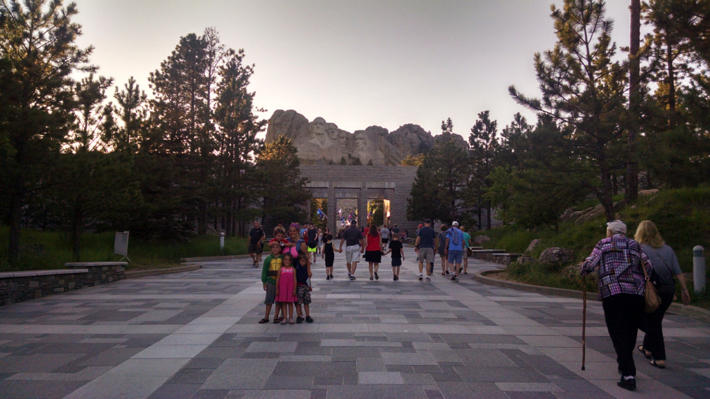 Crows walking beneath Mount Rushmore.