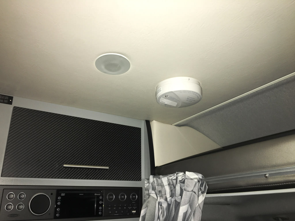 Smoke/carbon monoxide detector on ceiling of motorhome.