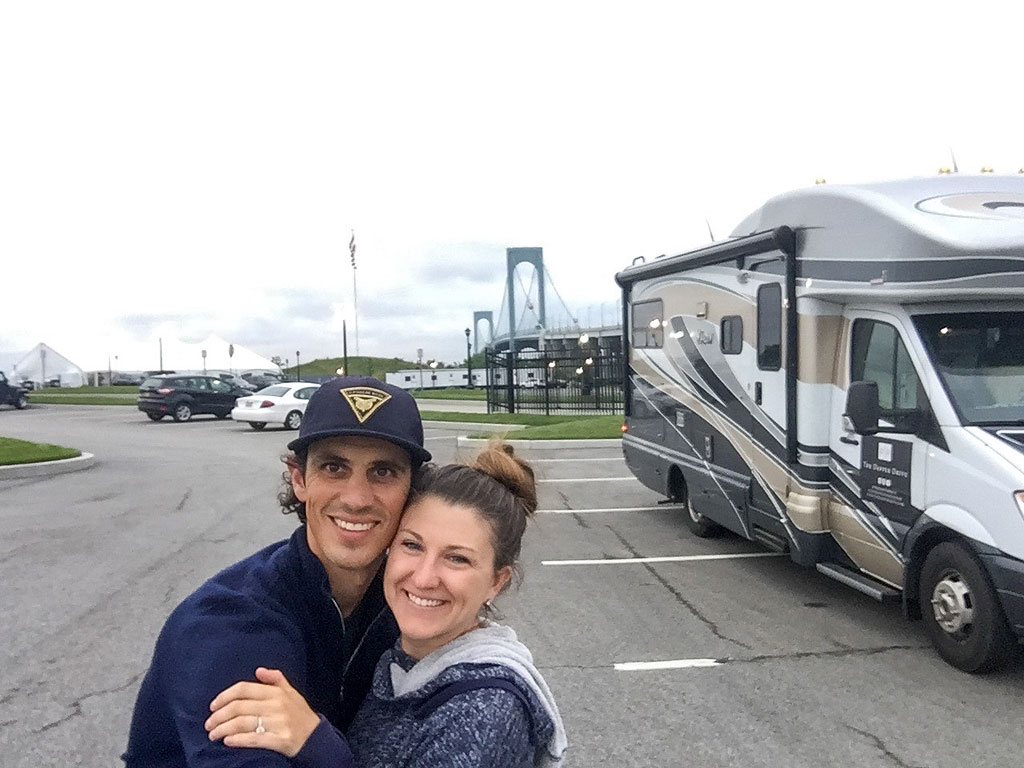 Jordan and Brittany standing outside their Winnebago View.