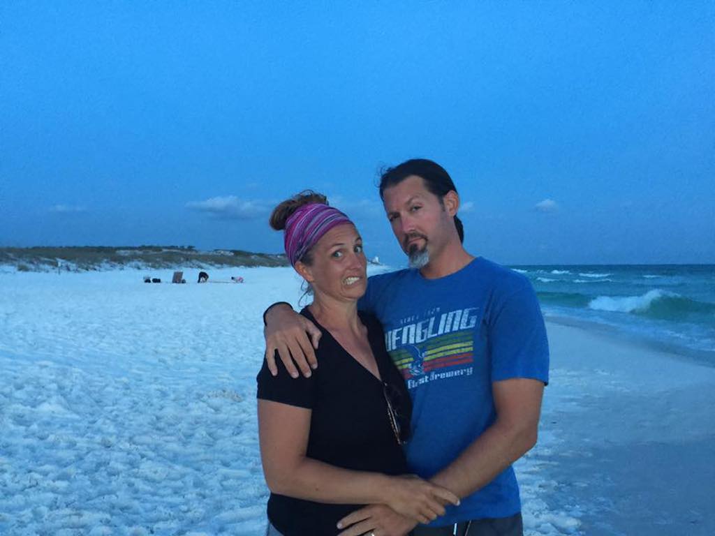 Bryanna and Craig standing together on beach