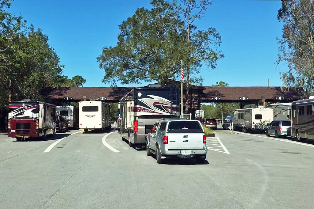 RVs lined up at entry to Disney Fort Wilderness