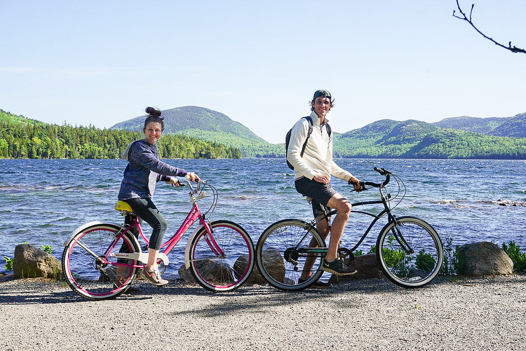 Couple taking bike ride along the coast