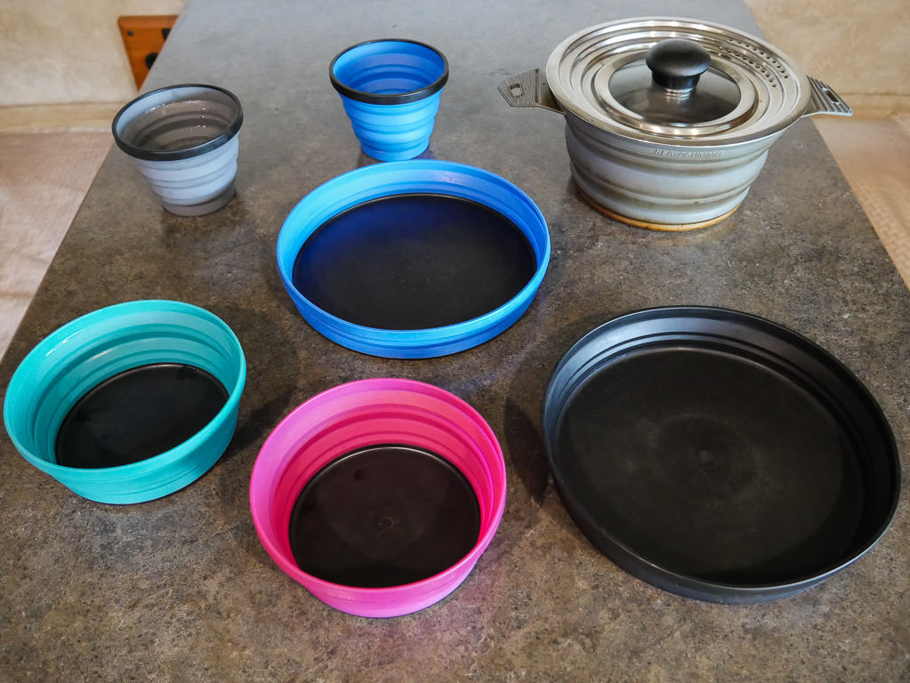 Examples of collapsible bowls, cups, plates and pots