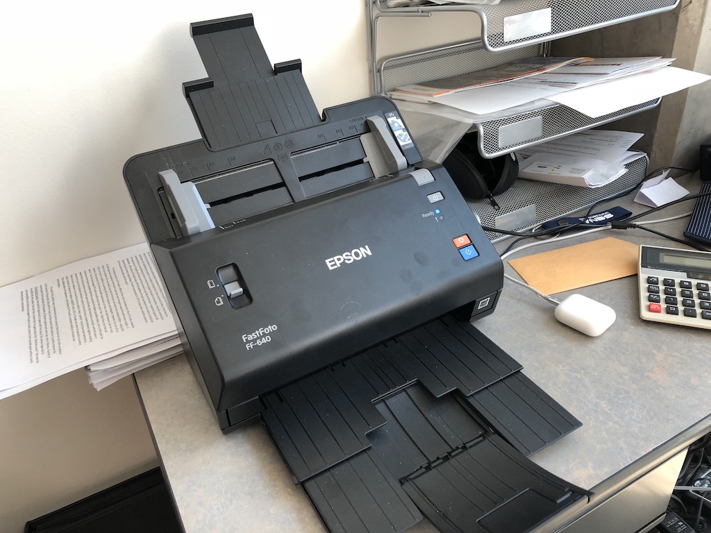 Black scanner sitting on counter