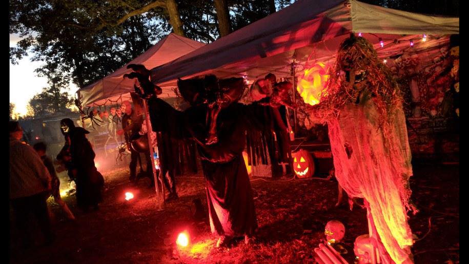 Tents decorated with Halloween decor.