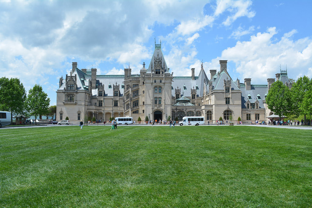 People gathered in front of the massive Biltmore Estate.