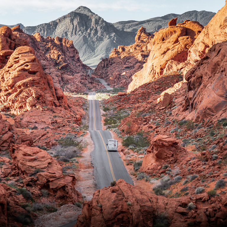 RV driving on road through the Valley of Fire