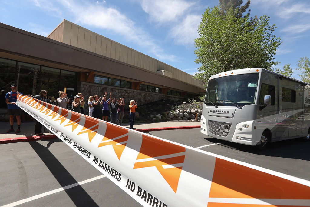 No Barriers and Winnebago employees greeting the Winnebago Accessibility Equipped 30T to the No Barriers Summit.